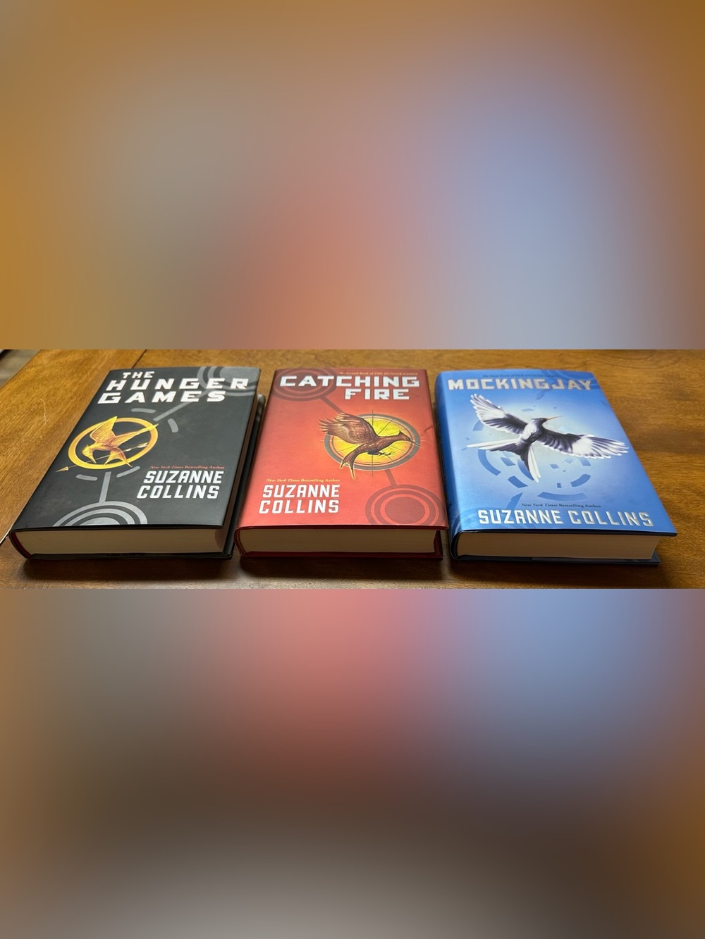 The Hunger Games, Catching Fire, and Mockingjay Novels By Suzanne Collins - Picture 2 of 8